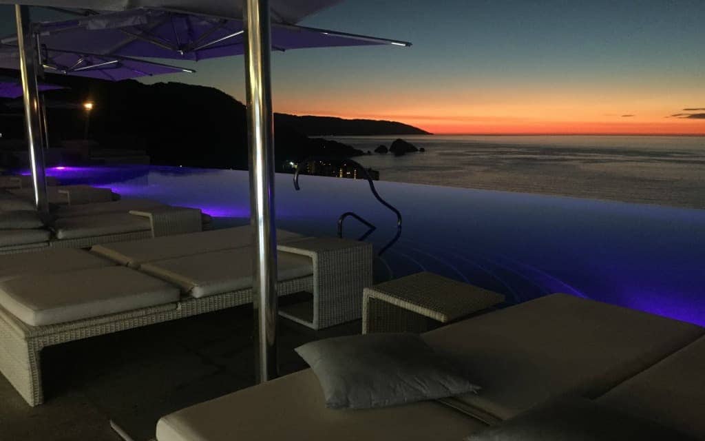 Hotel Mousai rooftop pool sunset