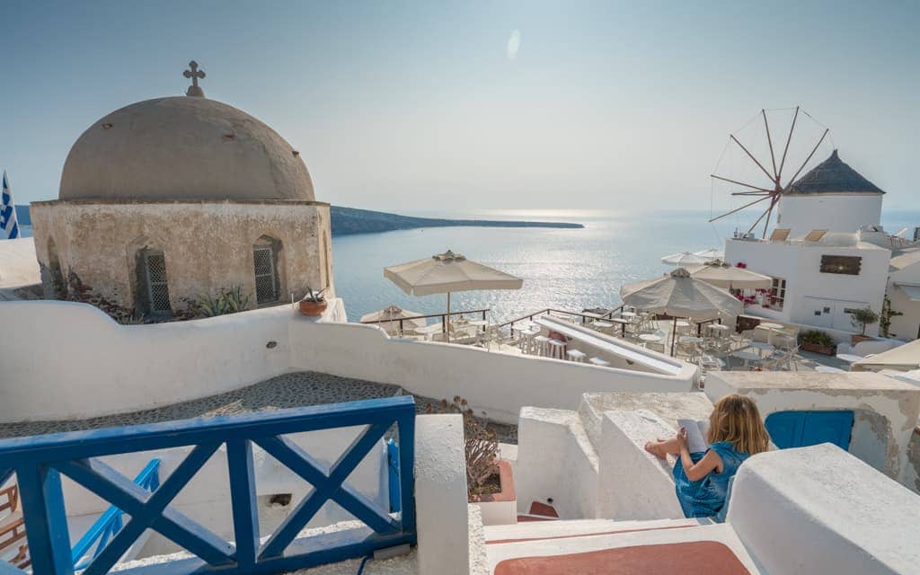 Best hotel views: We've stayed at three different places in and near Oia, all with amazing views. The view from our room at Golden Sunset Villas was just a little more interesting than the others - take the standard sunset view and add a church and a windmill!