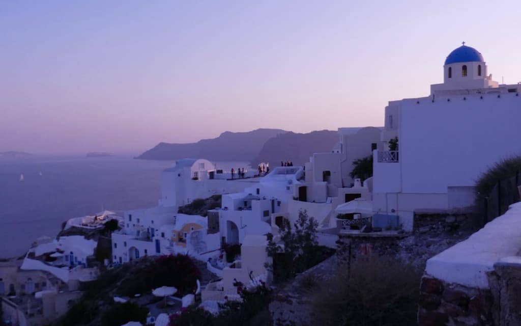 Oia, Santorini is an unforgettable destination for a girls trip.