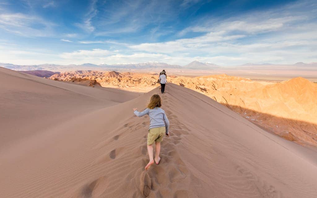 Family Travel 2018: Walking along a sand dune ridge in Chile's Atacama Desert