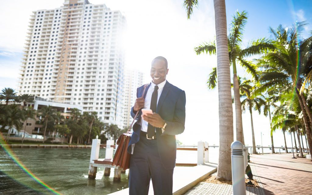 businessman texting in Miami