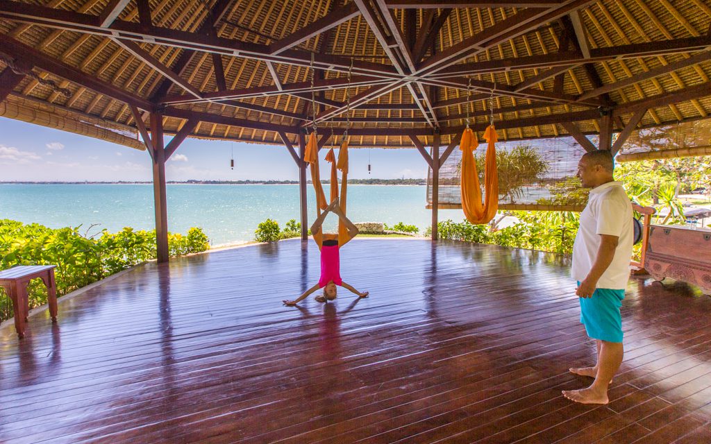 Around the world - My daughter's favorite activity in Bali? Anti-gravity yoga at Four Seasons Jimbaran Bay.