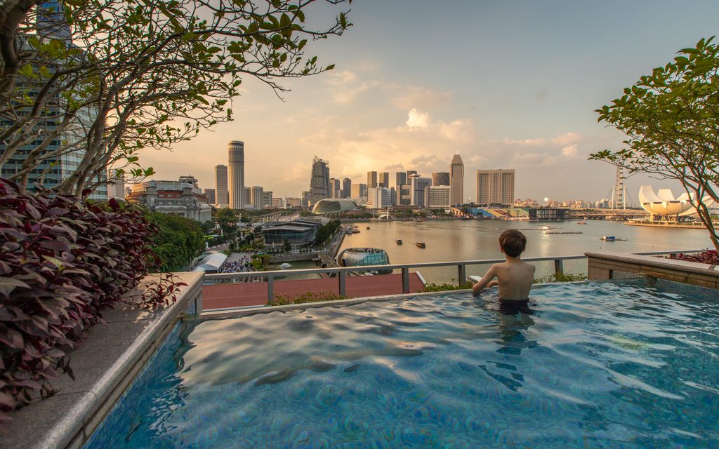Best Big City Hotels - Sunset from the pool at Singapore's Fullerton Bay Hotel