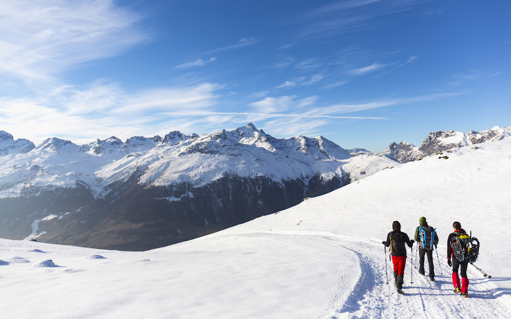 Hiking on snowy mountain