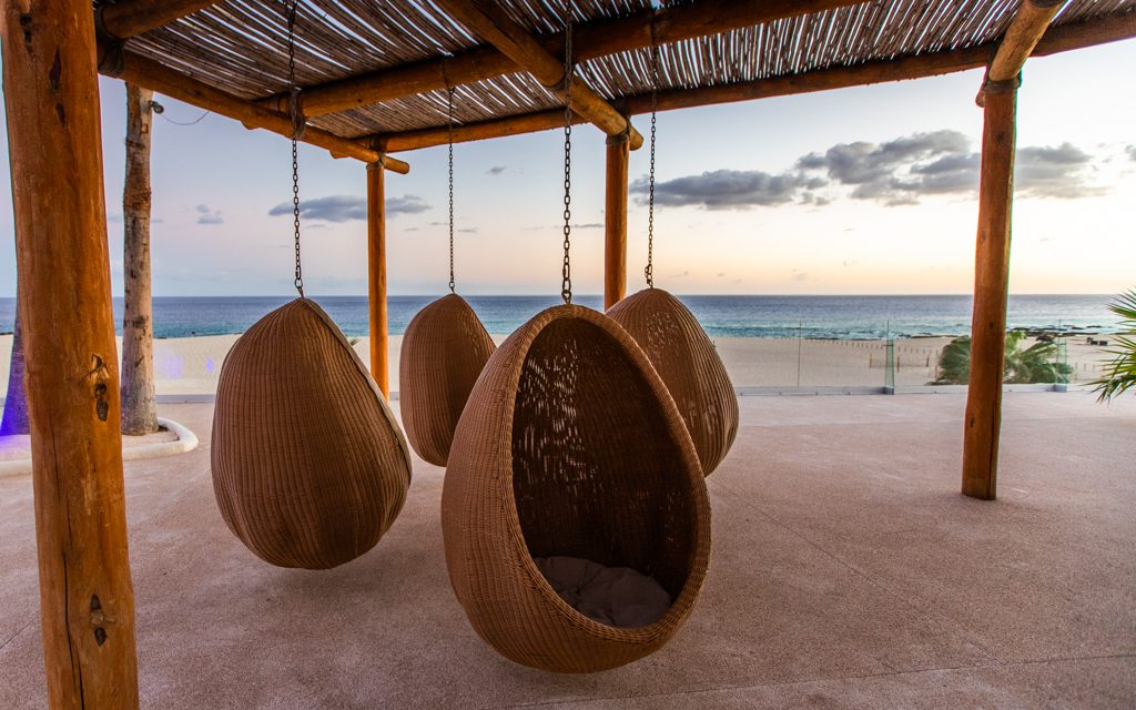 Los Cabos with Kids - Loved these hanging chairs overlooking the beach at Paradisus!