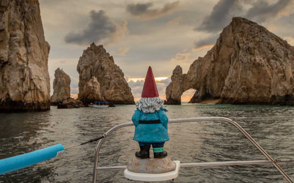 Los Cabos with Kids - The Roaming Gnome in front of the Los Cabos Land's End arch