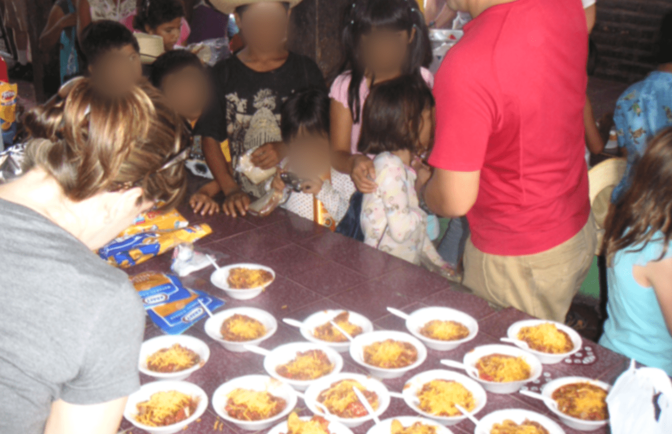 Feeding kids at Orphanage
