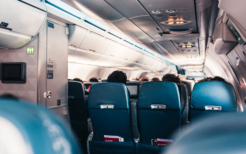 5 ways to actually enjoy flying economy