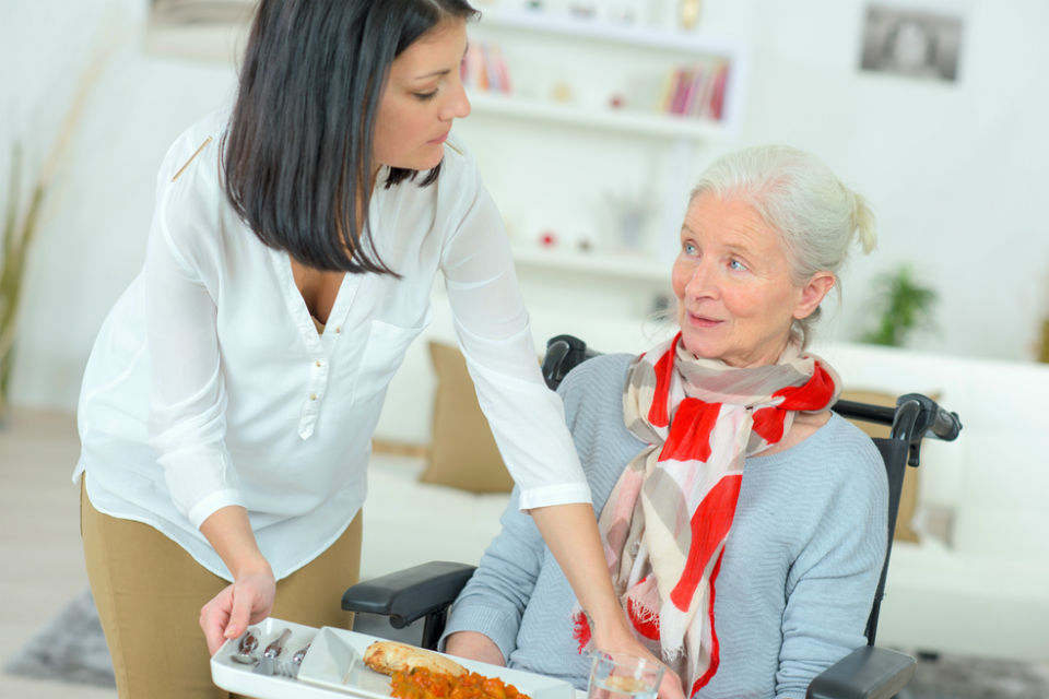 Helping disabled woman