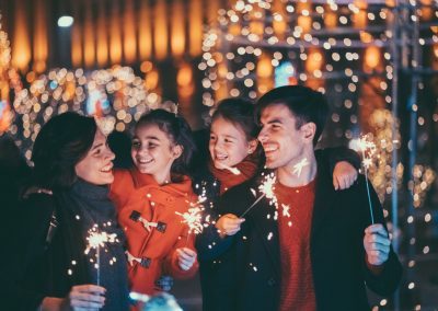 Happy family celebrating Christmas and New Year together